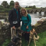 Ireland Mike and Gena with dogs in front of Stone Arch 2015